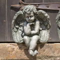 Small Seated Cherub Cast Stone Garden Statue P194219